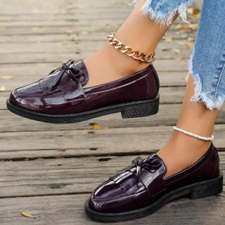 Mocassins bordeaux en cuir vernis et à franges pour femme