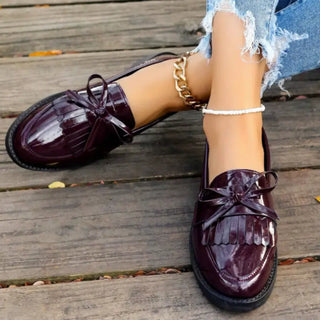 Mocassins bordeaux en cuir vernis et à franges pour femme